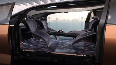 Футуристический дизайн и салон-гостиная: Nissan анонсировал автономный электрический минивэн