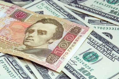 Що відбувалося з курсом гривні до долара у 2024 році: звіт НБУ
