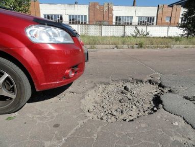 Водитель предоставил доказательства, что ДТП произошло из-за выбоины на трассе